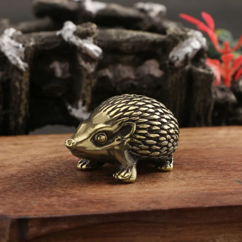 Brass hedgehog tea pet ornament