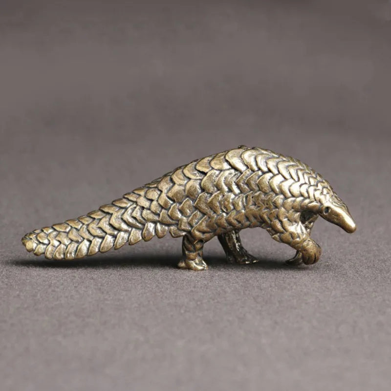 The Scaled One — Small Bronze Pangolin