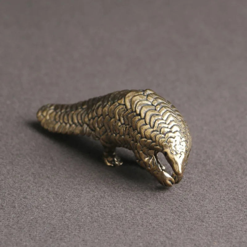 The Scaled One — Small Bronze Pangolin