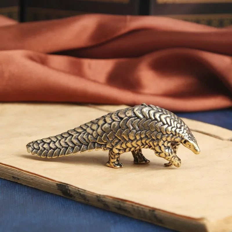 The Scaled One — Small Bronze Pangolin