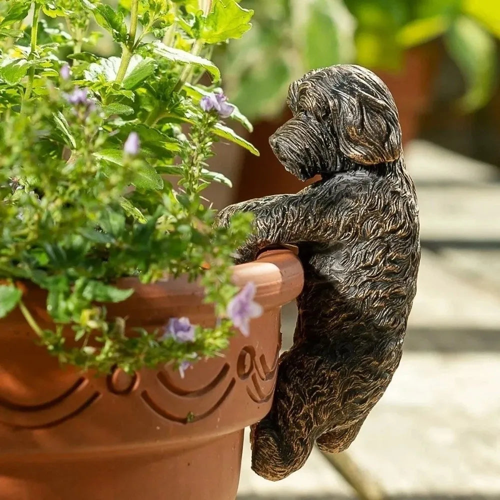 Bronze dog pot hanger