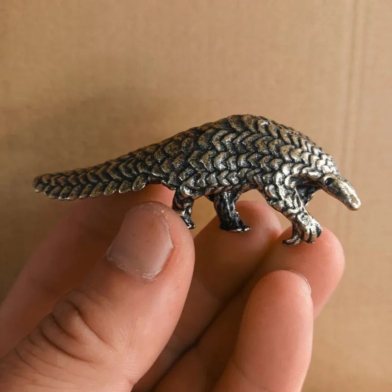 The Scaled One — Small Bronze Pangolin